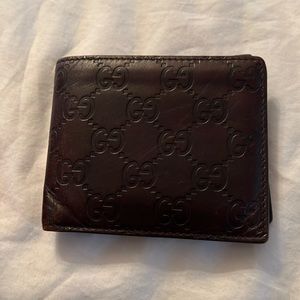 Gucci brown mens GG embossed wallet used